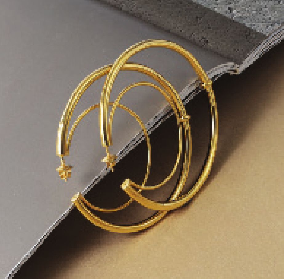 Gold hoop earrings made at Emerald